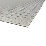 Metallic diamond plate panel on a white background